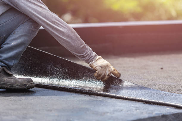 Professional Waterproofing technician working in Bowling Green, KY